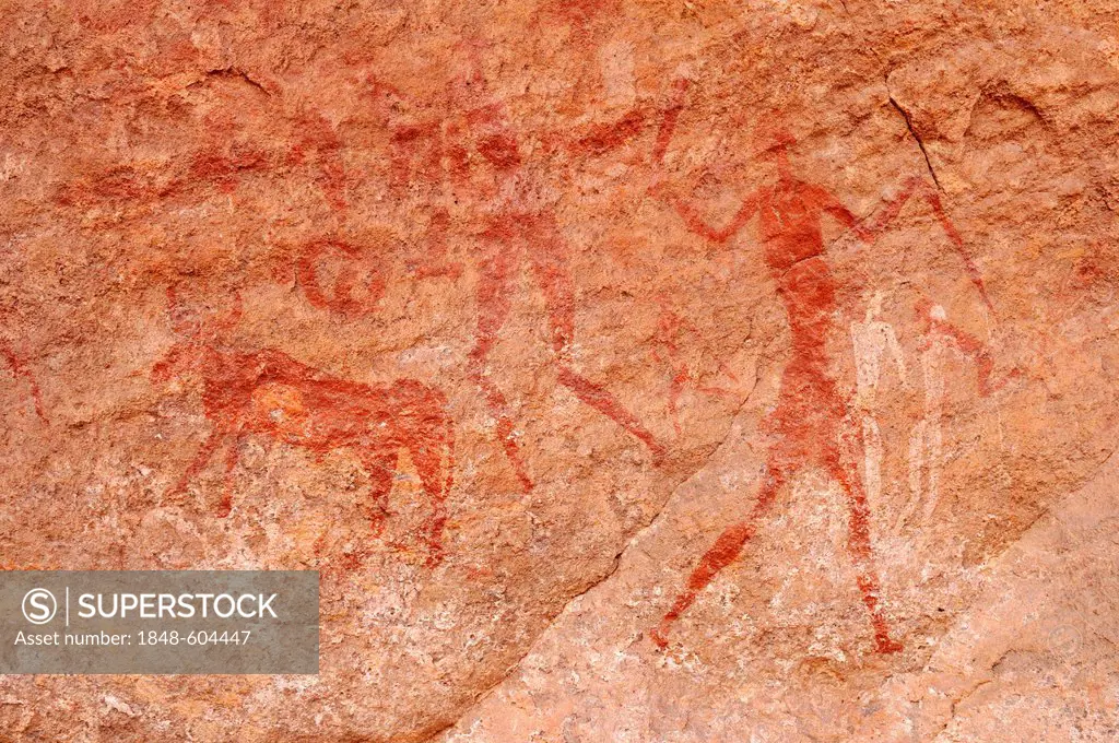 Painted people, neolithic rockart of the Acacus Mountains or Tadrart Acacus range, Tassili n'Ajjer National Park, Unesco World Heritage Site, Algeria,...