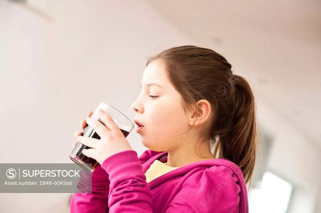 Girl drinking a coke