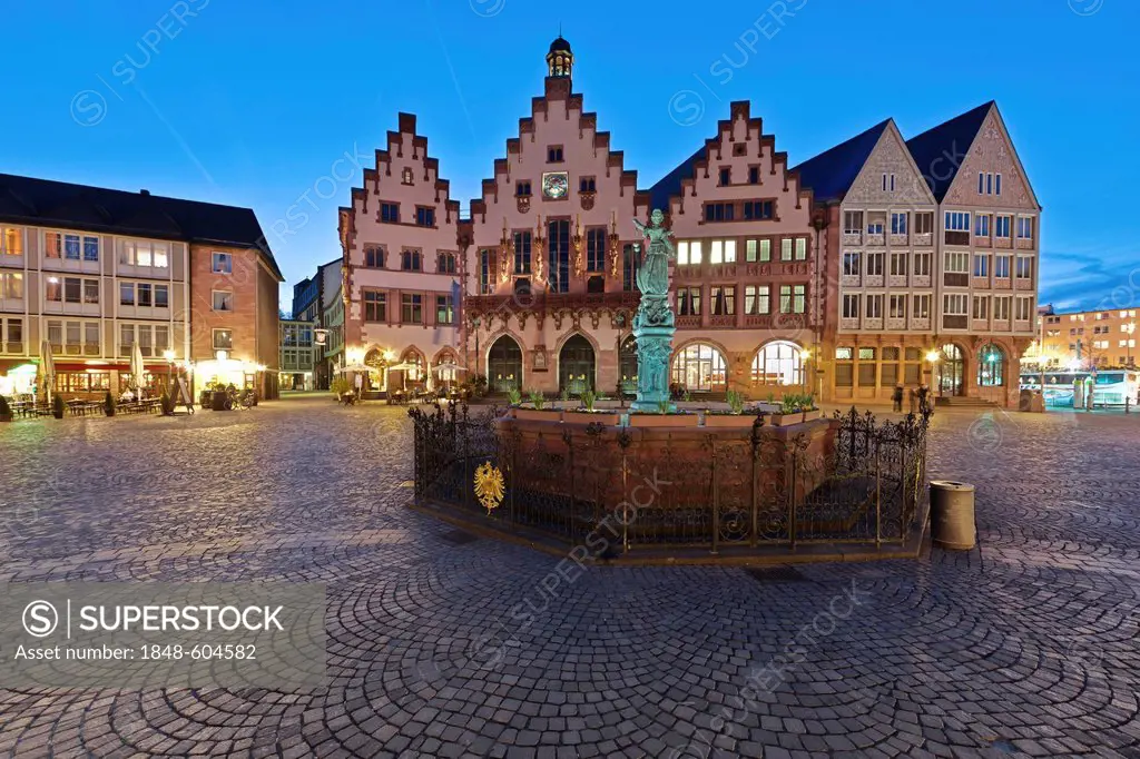Roemerberg square with Gerechtigkeitsbrunnen fountain, also know as Justitiabrunnen fountain with the Justitia statue made of bronze and the historic ...