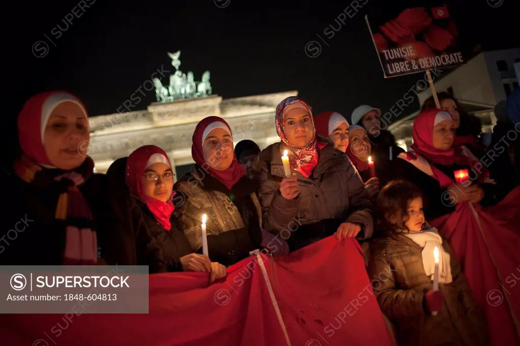 Tunisian exiles in front of Brandenburg Gate demonstrating their solidarity with the Jasmin Revolution in Tunisia and demanding freedom and democracy ...