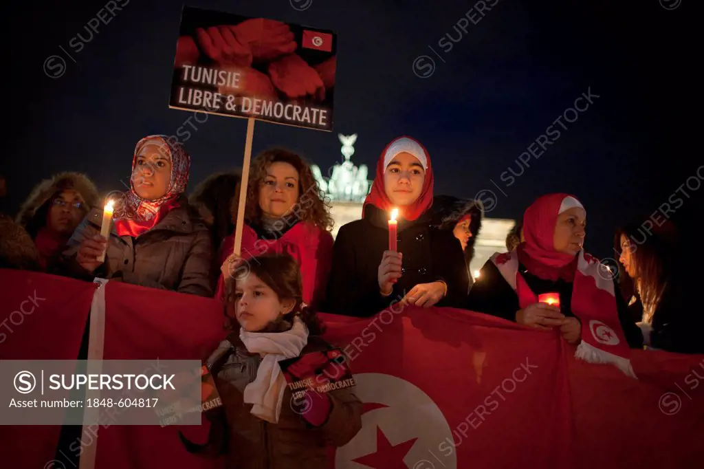 Tunisian exiles in front of Brandenburg Gate demonstrating their solidarity with the Jasmin Revolution in Tunisia and demanding freedom and democracy ...