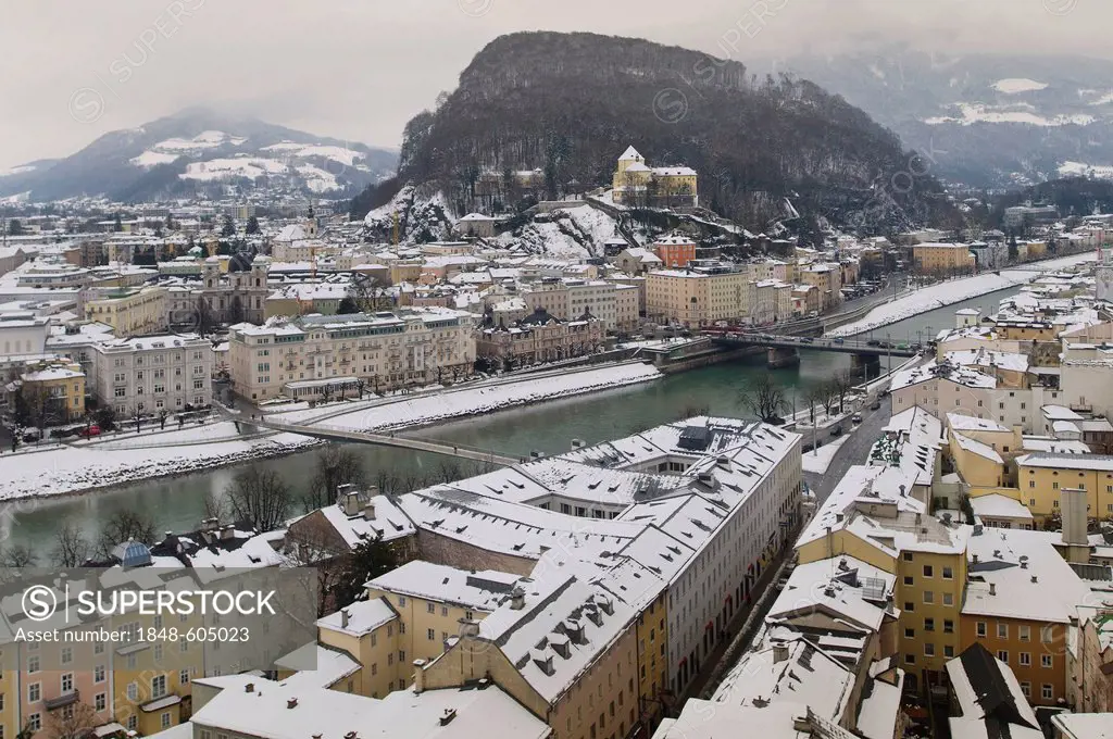 View from Moenchsberg Mountain over the wintry right bank of the Salzach towards Kapuzinerberg Mountain and Capuchin Monastery, UNSCO World Heritage S...