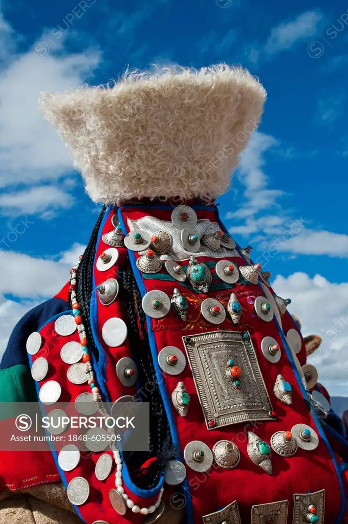 Traditionally dressed woman, traditional festival of the tribes in Gerze, Western Tibet, Asia