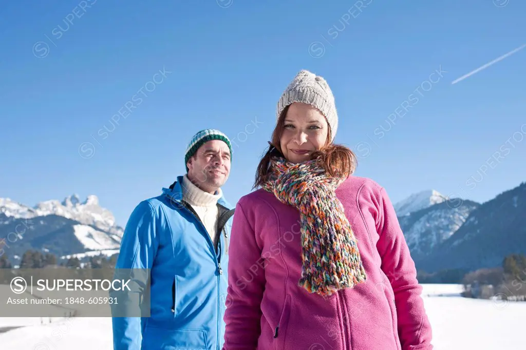 Couple in the snow in the mountains