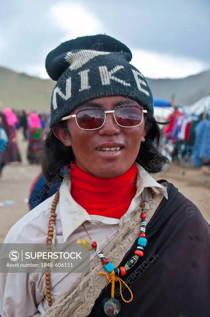Tibetan man in the town of Tsochen, Western Tibet, Tibet, Asia