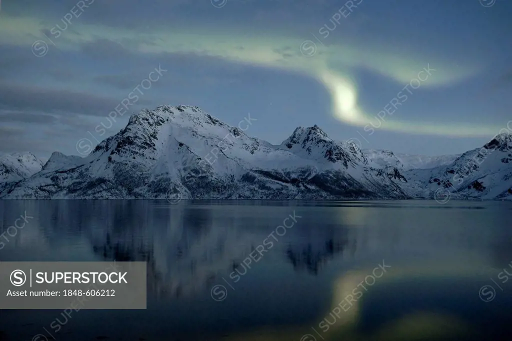 Polar lights (Aurora borealis), above Stortinden mountain in Oksfjorden, Oksfjord, Loppa, Finnmark, Norway, Europe