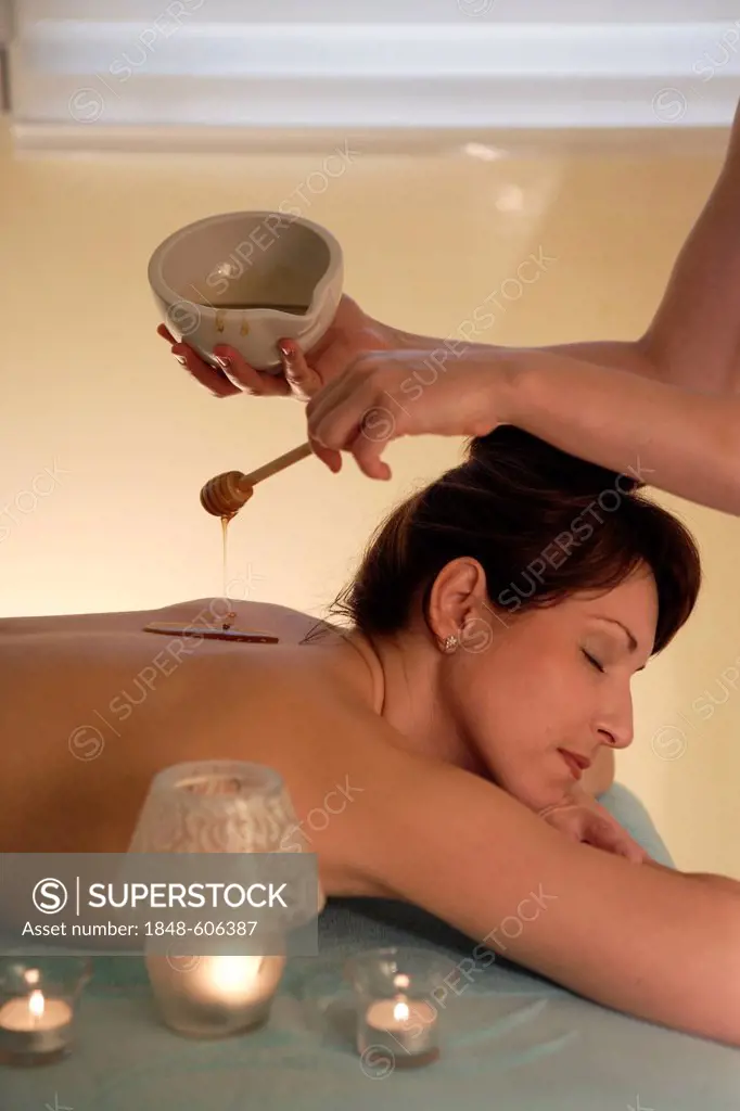 Woman, 35, having a massage with honey