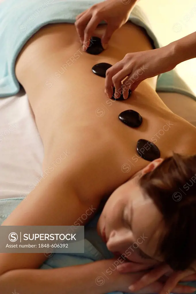 Woman, 35, having a hot stone massage