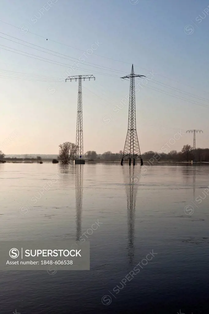 Electricity pylons in the Elbe flood, Ferchland, Saxony-Anhalt, Germany, Europe