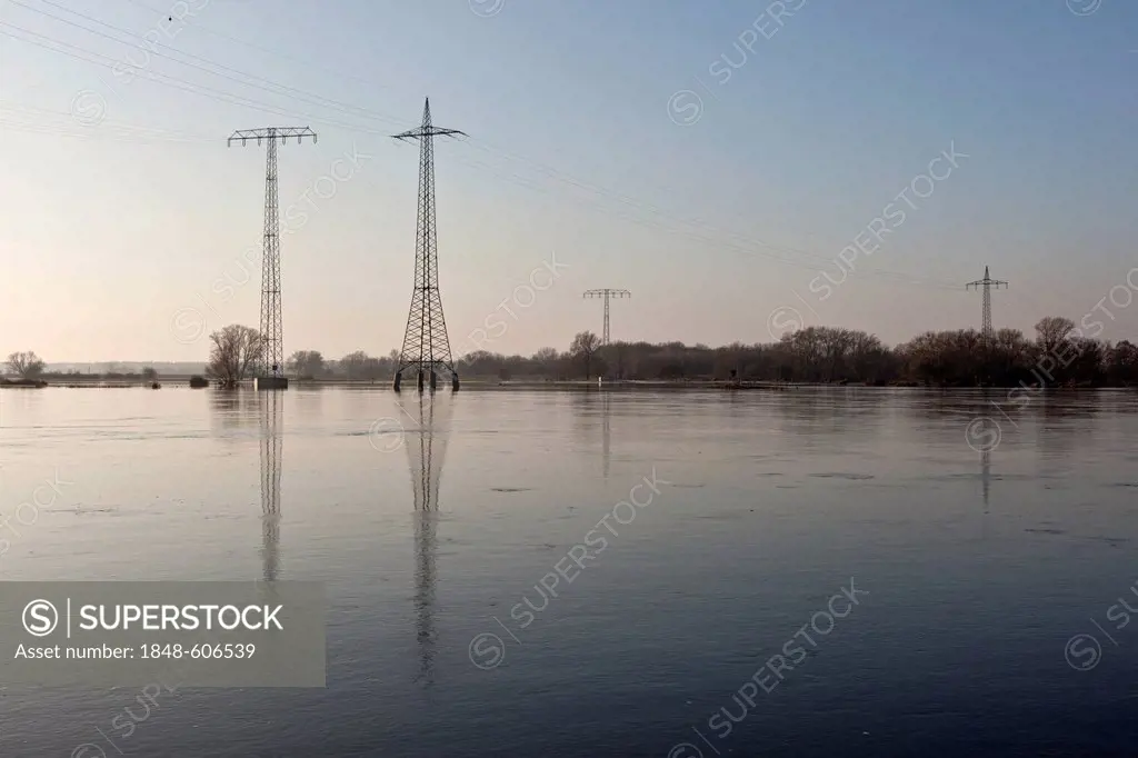 Electricity pylons in the Elbe flood, Ferchland, Saxony-Anhalt, Germany, Europe
