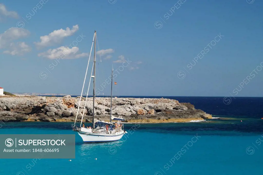 Bay with a boat near Son Xoriguer, Menorca, Spain, Europe