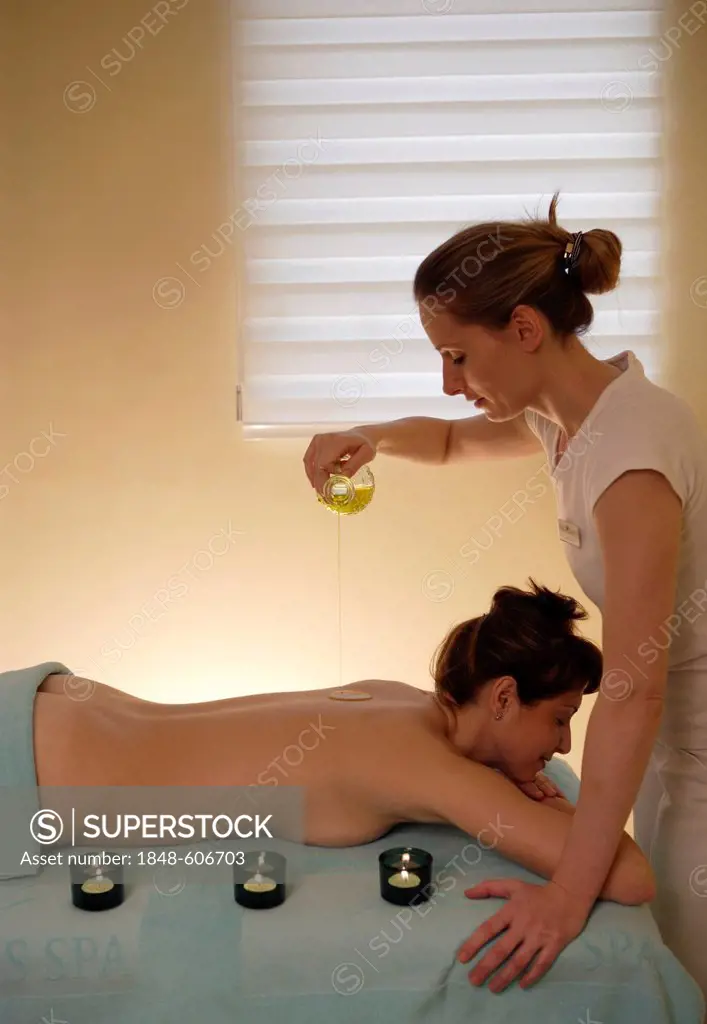 Woman, 35, having a massage with oil