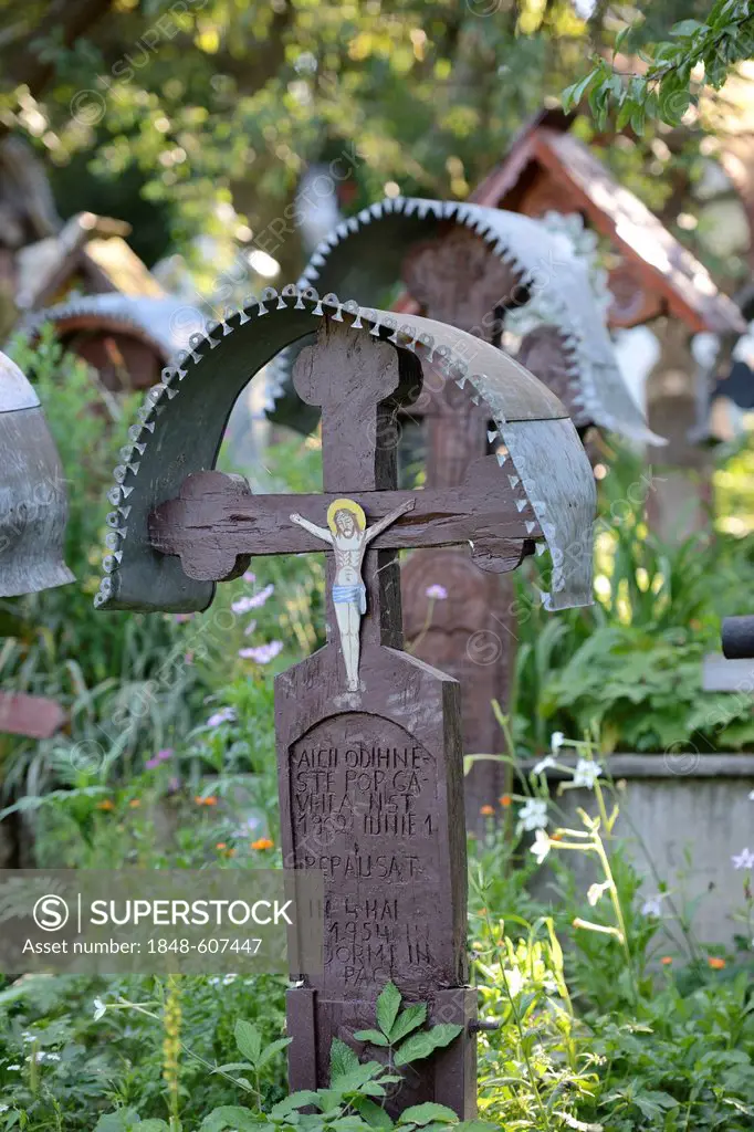 Crosses in the cemetery of the wooden church Biserica Din Deal, Leude Suzani, Iza Valley, Maramures, Romania, Europe