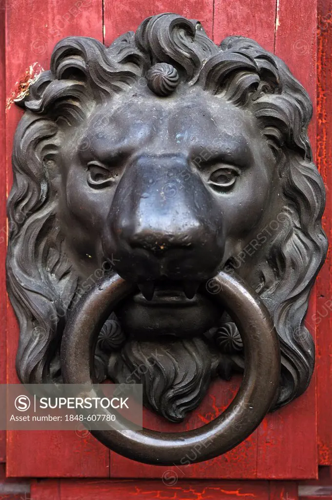 Lion head door knocker on the entrance portal of the armory, Zeugplatz 4, Augsburg, Bavaria, Germany, Europe