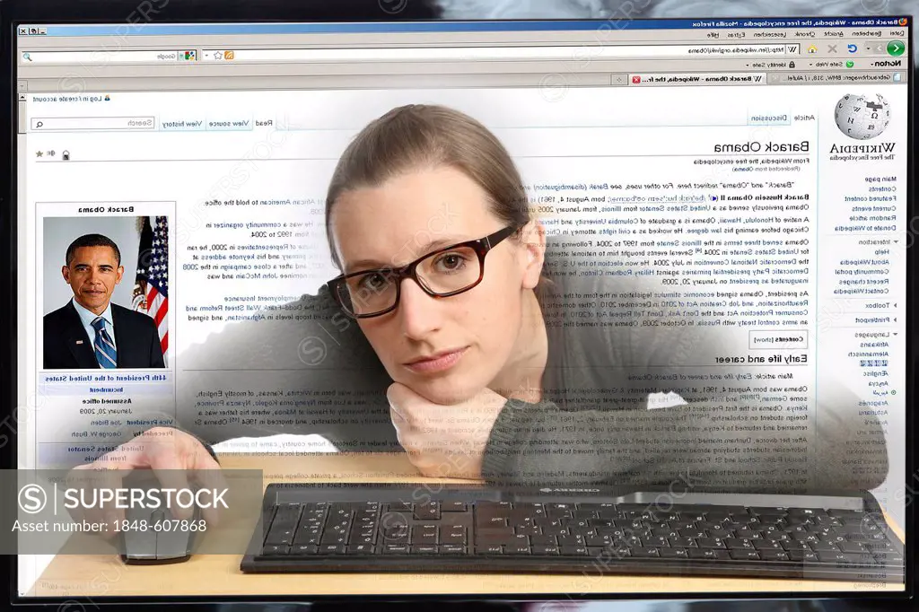 Young woman sitting at a computer surfing the Internet, researching on a page of the online encyclopedia Wikipedia, view from within the computer, sym...
