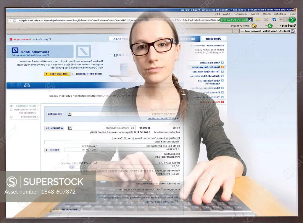 Young woman sitting at a computer surfing the Internet, viewing an Internet banking site, Deutsche Bank, making an online payment, view from within th...