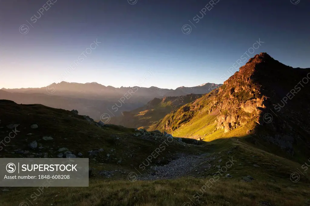 Sunrise in the Glarus Alps, seen from Berglimatt Lake looking towards the Tschingelhoerner Mountains and Martin's Hole, Canton of Glarus, Switzerland,...