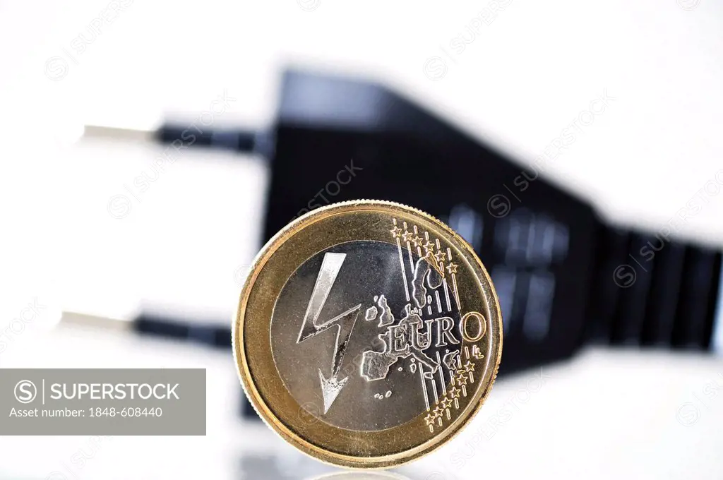 One euro coin with a lightening bolt power symbol in front of a power plug, symbolic image for rising electricity costs