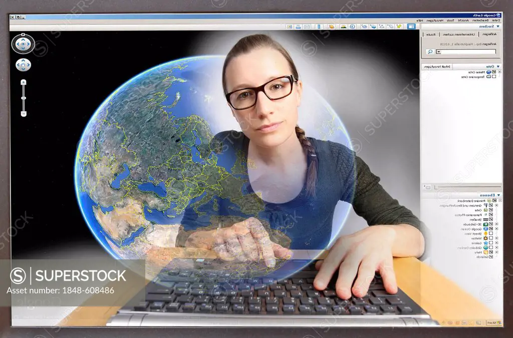 Young woman sitting at a computer surfing the Internet, viewing Google Earth, view from within the computer, symbolic image