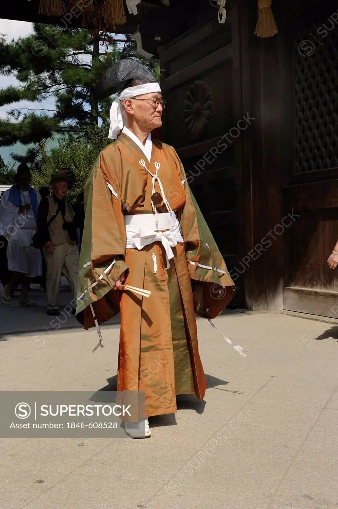Traditionally dressed Japanese man at a temple festival, Matsuri Festival, at the Kitano Tenmangu Shrine, Kyoto, Japan, Asia