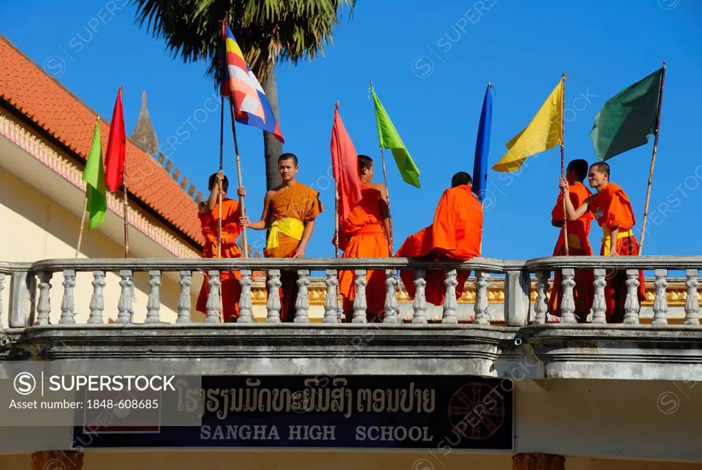 Theravada Buddhism, monks in orange robes on the balcony, convent school, Sangha High School, Wat Xayaphoum temple, Savannakhet, Laos, Southeast Asia,...