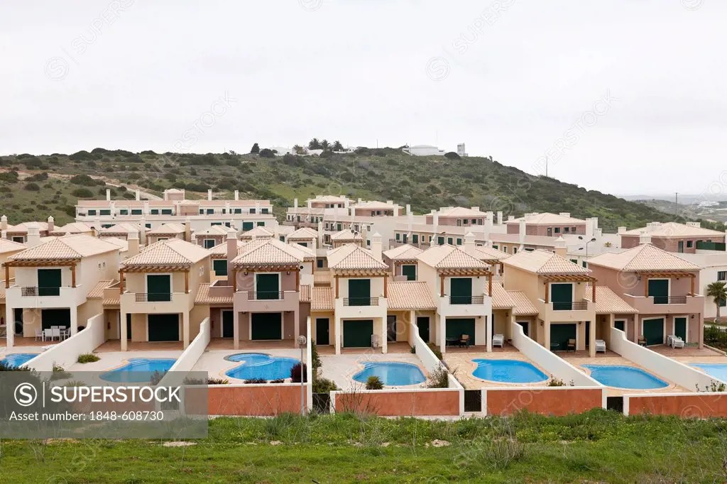 Monotone, uninhabited cottages, town houses with pools, Algarve, Portugal, Europe
