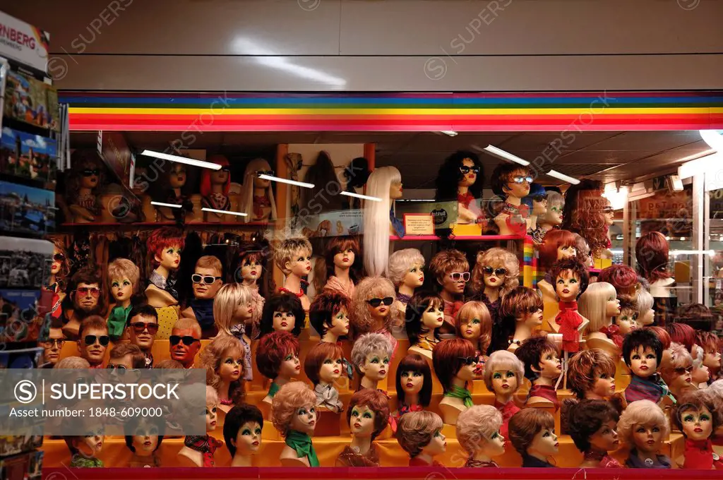 The window of a wig shop in a mall, Nuremberg, Middle Franconia, Bavaria, Germany, Europe