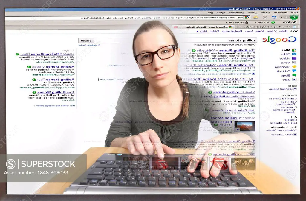 Young woman sitting at a computer surfing the Internet, viewing a page for Google, view from within the computer, symbolic image