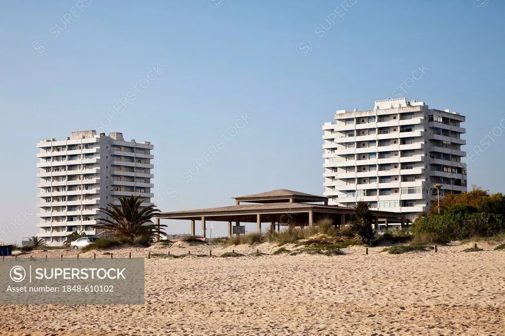 Apartment towers, unfinished buildings on the beach of Alvor, Algarve region, Portugal, Europe