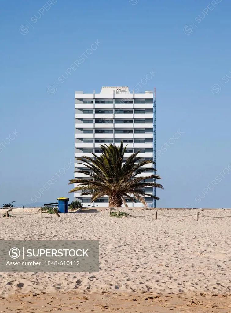 Apartment tower, unfinished building on the beach of Alvor, Algarve region, Portugal, Europe