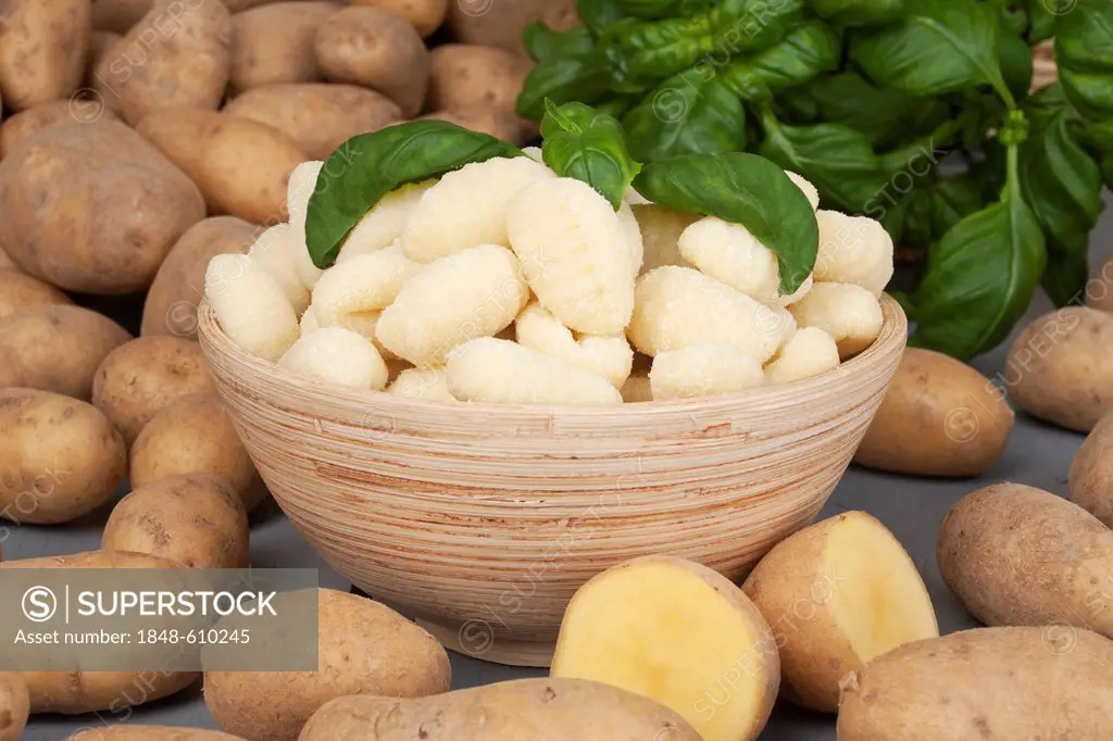 Gnocchi in a bowl and potatoes