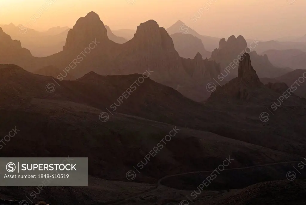 Sunrise view from Assekrem over the volcanic landscape of Atakor, Hoggar, Ahaggar Mountains, Wilaya Tamanrasset, Algeria, Sahara, North Africa