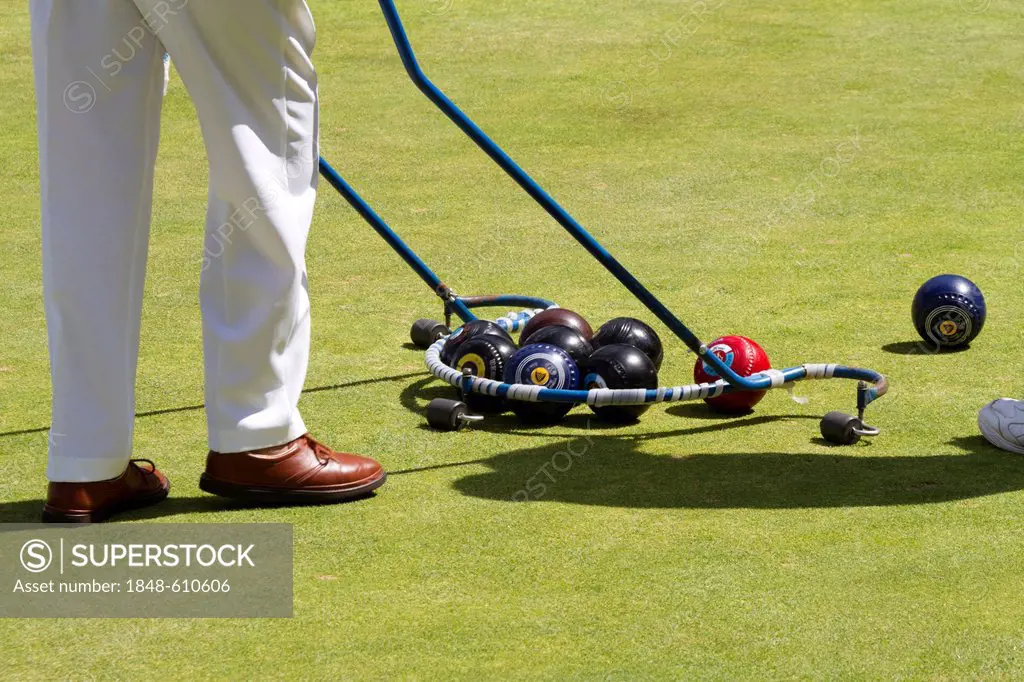 Balls being collected on the bowling green, Helston Bowling Club, Helston, Cornwall, England, United Kingdom, Europe