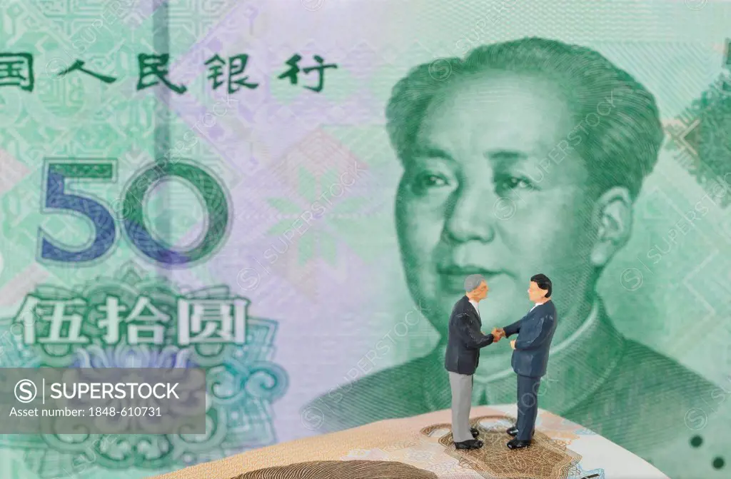 Manager figurines on Chinese yuan, renminbi or Yuán Kuài, currency of the People's Republic of China, symbolic image for business, business men, seali...