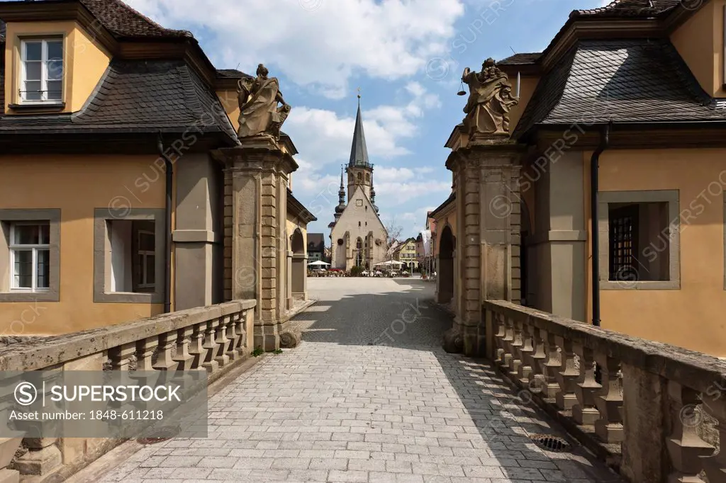 View from the gatehouse of Weikersheim Castle to St Georg town church and the marketplace of Weikersheim, Baden-Wuerttemberg, Germany, Europe