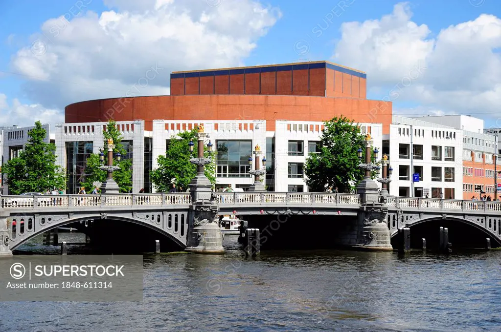 Blauwbrug bridge across the Amstel river, Stopera opera house on Waterloo Plein square at the back, city centre, Amsterdam, North Holland, the Netherl...