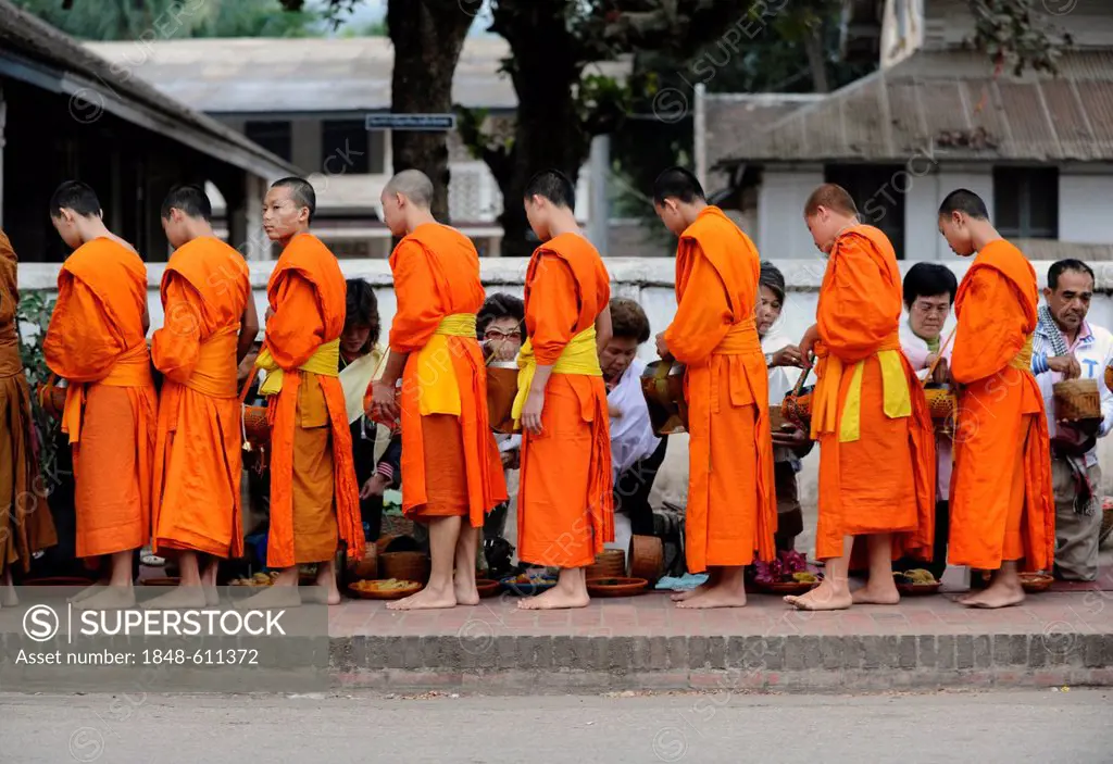 Morning begging for alms of the Buddhist monks, Luang Prabang, Laos, Southeast Asia, Asia