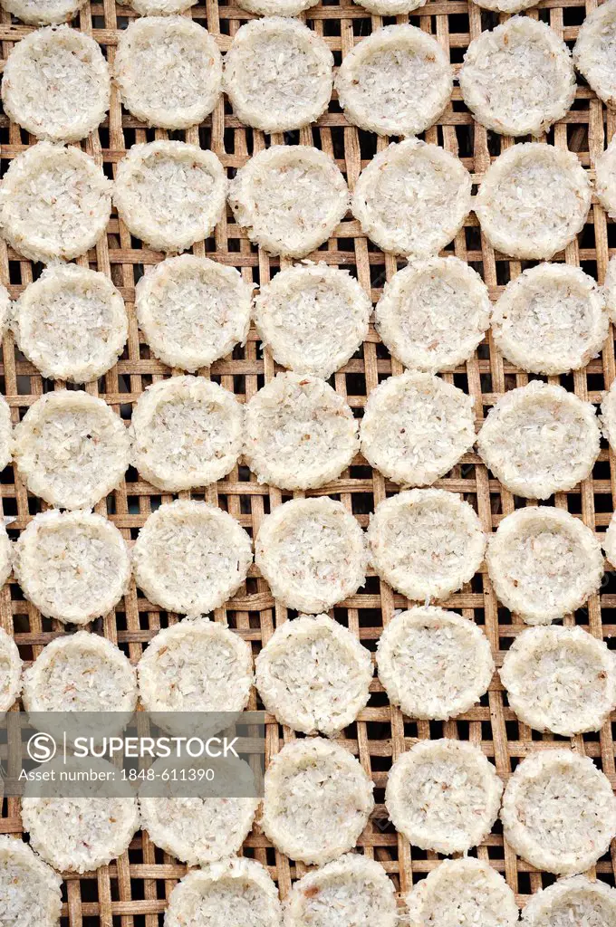 Rice biscuits drying in the open air, Luang Prabang, Laos, Southeast Asia