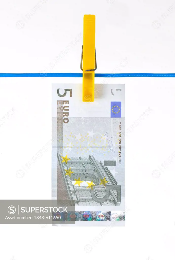 Euro bank note on a clothesline, symbolic image for money laundering, dirty money