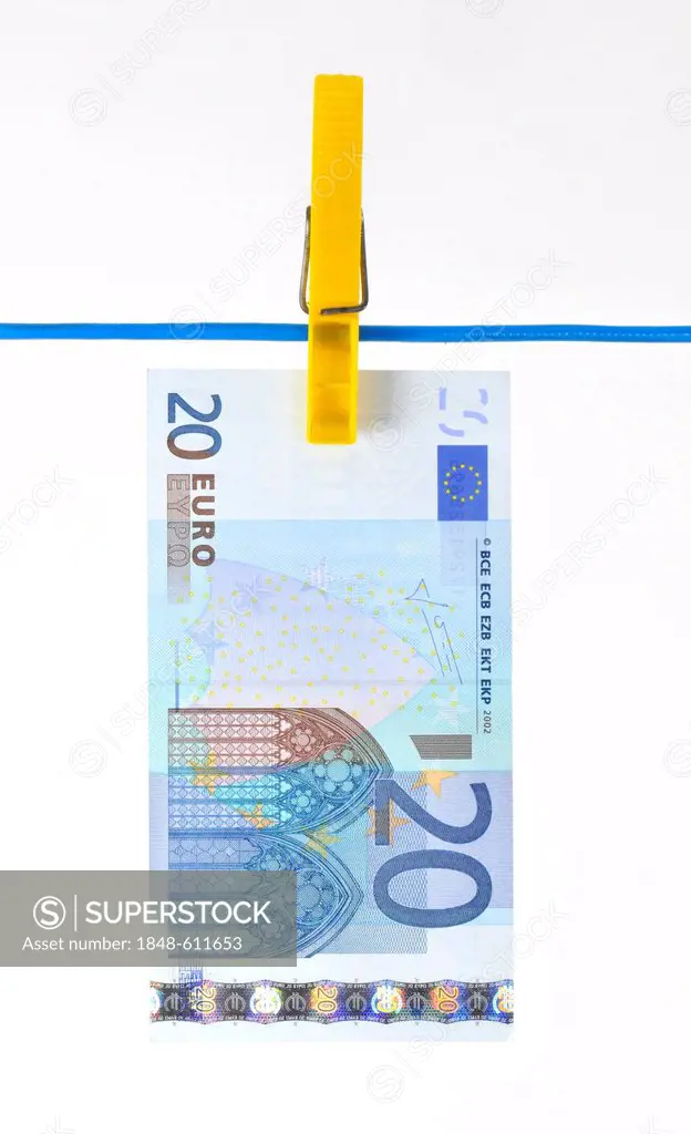 Euro bank note on a clothesline, symbolic image for money laundering, dirty money