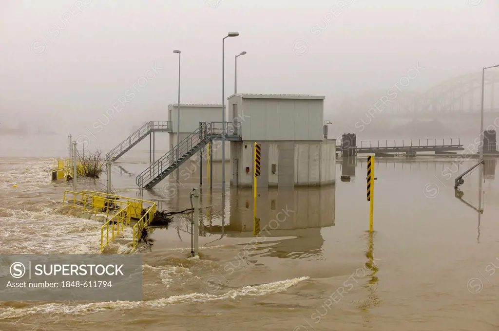 Flooded lock on a foggy day, floodwaters on the Rhine river, Kostheim lock, Ginsheim-Gustavsburg, Germany, Europe