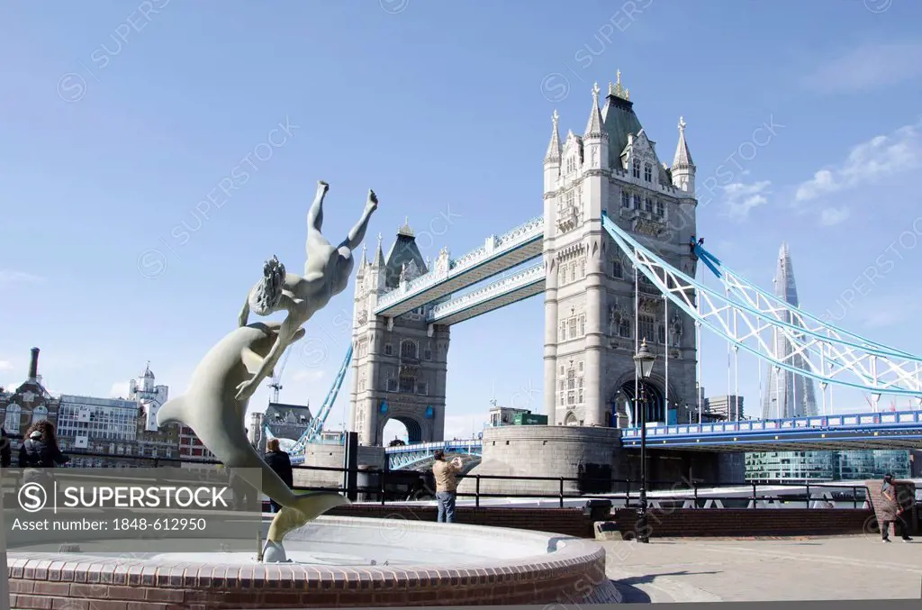 Tower Bridge with sculpture Girl with a Dolphin by David Wynne, River Thames, London, England, United Kingdom, Europe