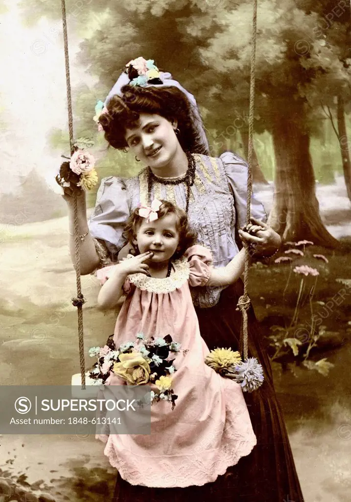 Woman and girl on a swing, historical photograph, 1905