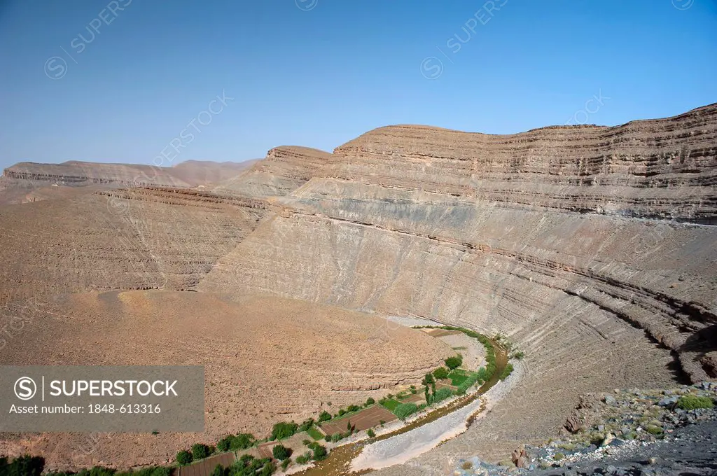 Mountains, escarpment landscape with small fields in the river valley, High Atlas, Dades valley, Morocco, Africa