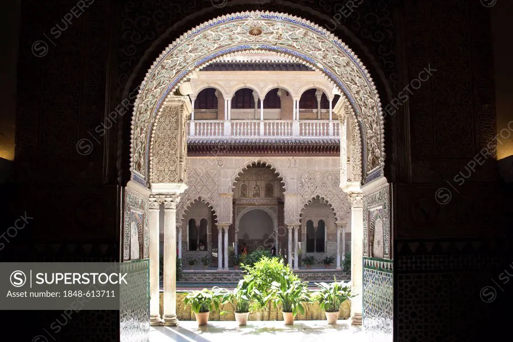 Moorish ornamentation on the Patio de las Doncellas in the Moorish King's Palace of Real Alcazar, UNESCO World Heritage Site, Seville, Andalusia, Spai...
