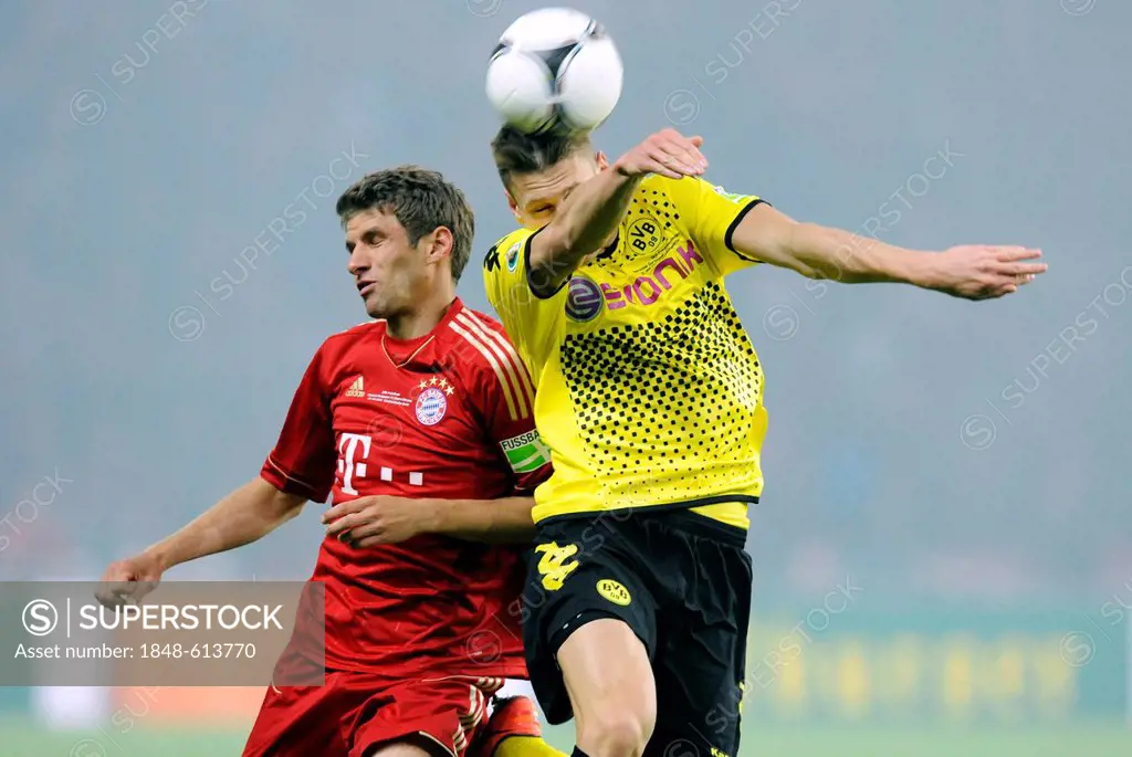 Thomas Mueller, FC Bayern Munich, left, Lukasz Piszczek, Borussia Dortmund, right, DFB Cup final, BVB or Borussia Dortmund vs FC Bayern Munich 5-2, 05...