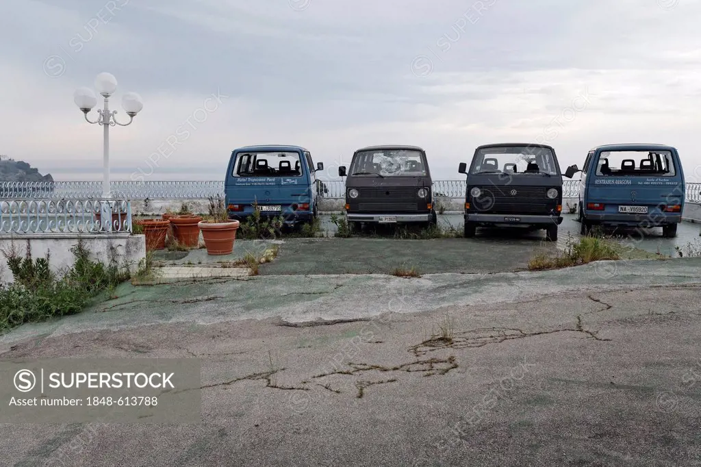 Four discarded minibuses, parked in a row, Ischia Island, Gulf of Naples, Campania, Southern Italy, Italy, Europe