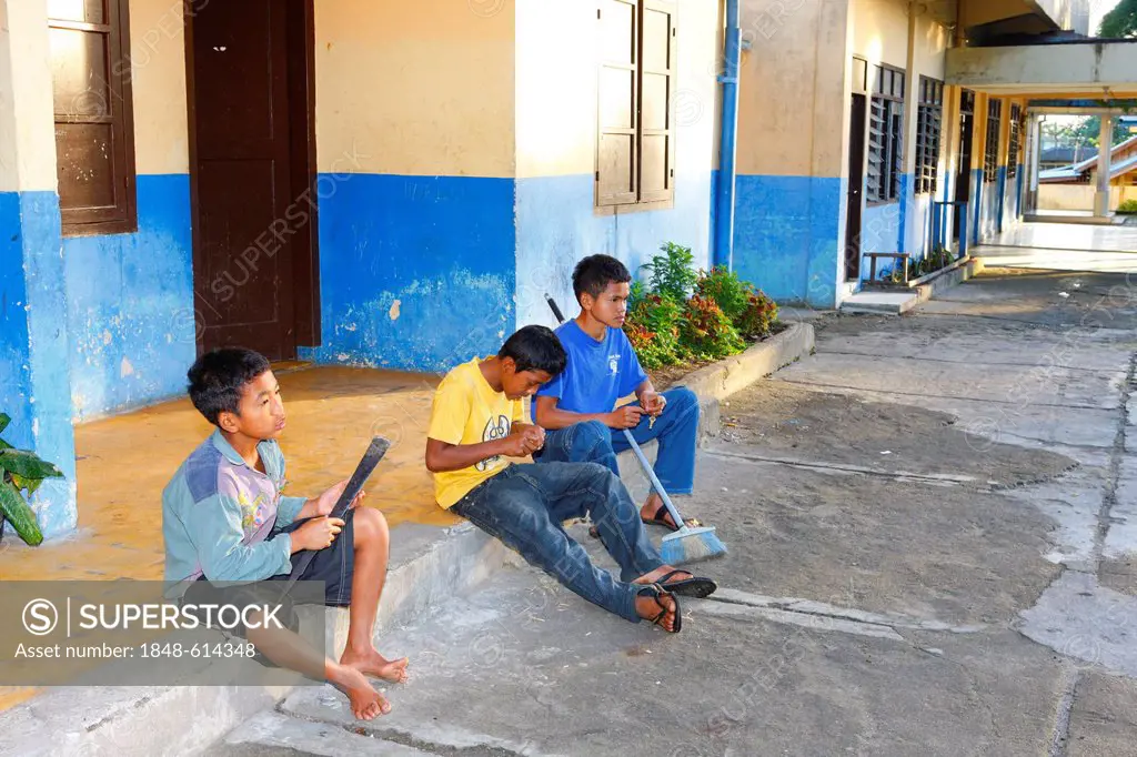 Teenage boys in the yard, Gelora Kasih orphanage, Kabanjahe, Batak region, Sumatra, Indonesia, Southeast Asia, Asia