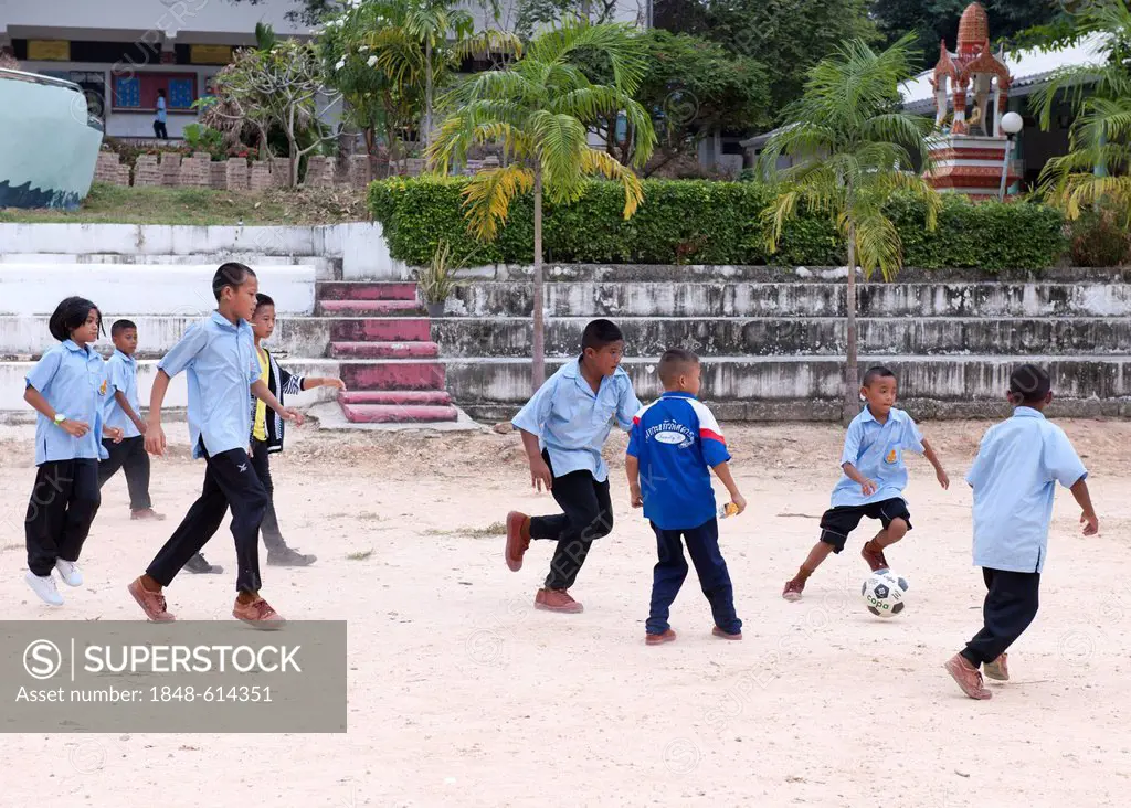 Children playing soccer, Koh Samet, Thailand, Asia
