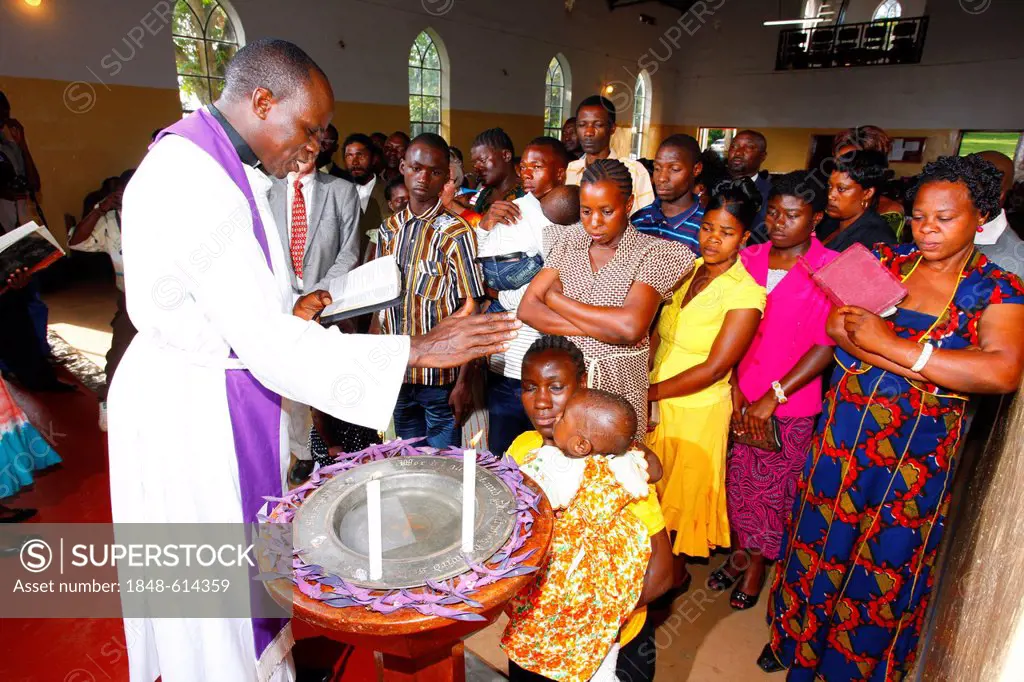 Baby being baptised, Bukoba, Kagera region, Tanzania, Africa